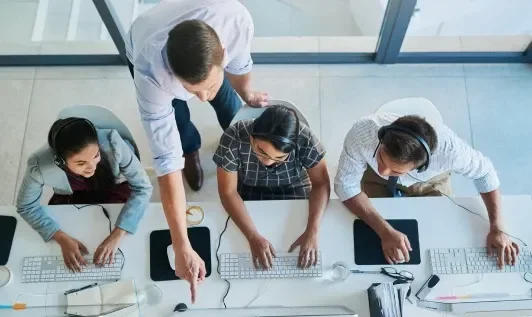 People Working at Desk